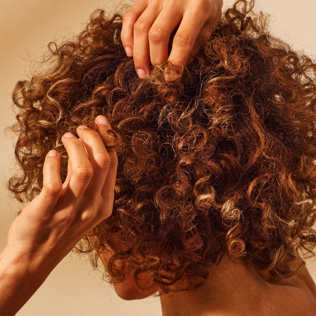 girl with curly hair